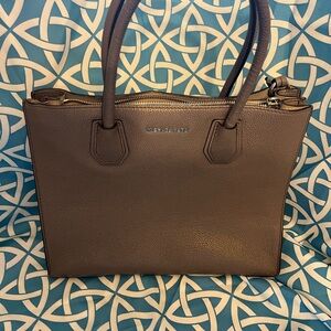 Michael Kors grey used hand bag.